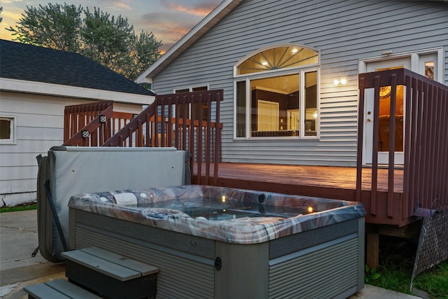 2101 6th Ave NE, Austin, MN 55912 - deck at dusk with a hot tub