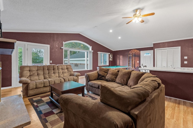 2101 6th Ave NE, Austin, MN 55912 - living area featuring billiards table, light wood-type flooring, a ceiling fan, lofted ceiling, and crown molding
