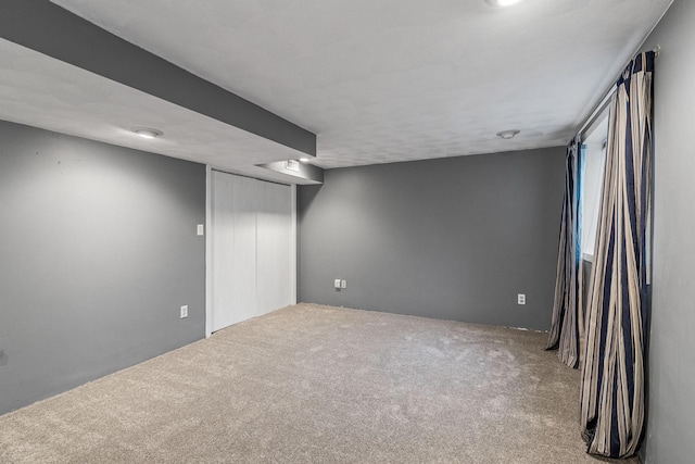2101 6th Ave NE, Austin, MN 55912 - spare room with carpet