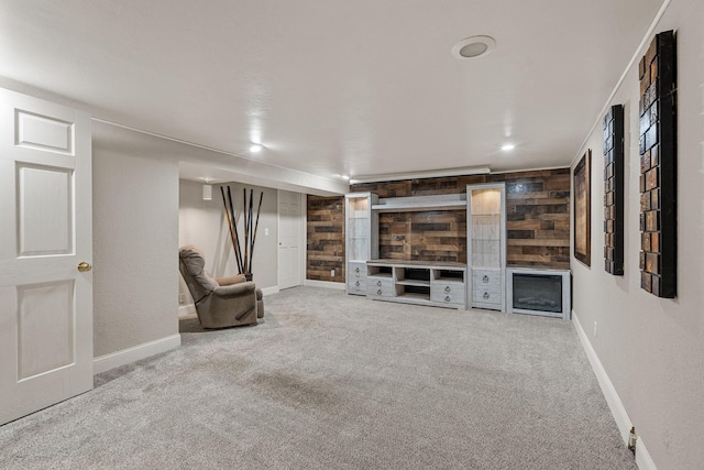 2101 6th Ave NE, Austin, MN 55912 - unfurnished living room featuring carpet floors, baseboards, and recessed lighting