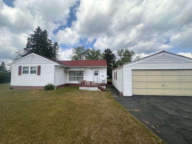 21 Glen Cir, Babbitt, MN 55706 - view of front of property with a garage and a front yard