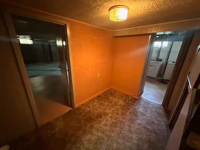 21 Glen Cir, Babbitt, MN 55706 - empty room with carpet flooring and washer / dryer