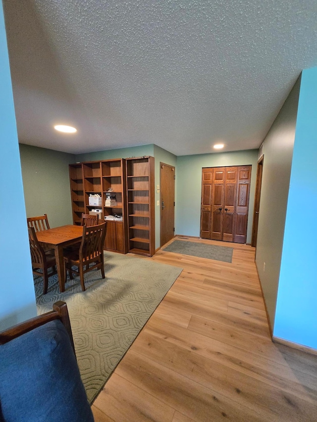 1924 Greenfield Ln SW Unit 201, Rochester, MN 55902 - dining space with wood finished floors, a textured ceiling, and recessed lighting