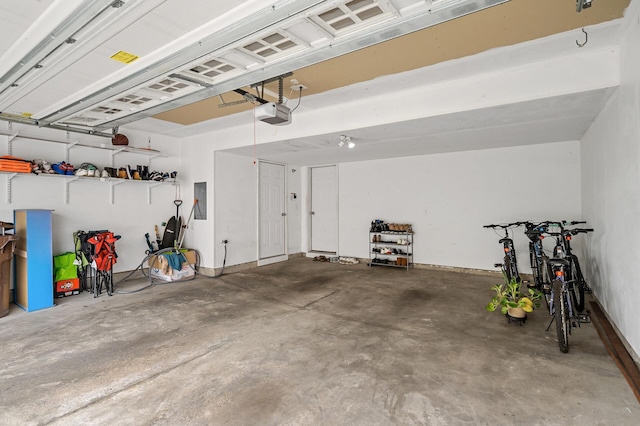 1949 Commonwealth Blvd Unit 2, Chanhassen, MN 55317 - garage featuring a garage door opener