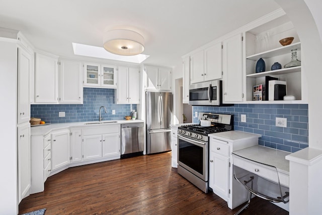4450 Forest Lake Lndg, Orono, MN 55364 - kitchen with stainless steel appliances, tasteful backsplash, light countertops, and white cabinets