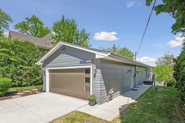 4450 Forest Lake Lndg, Orono, MN 55364 - view of side of property with a yard and a garage
