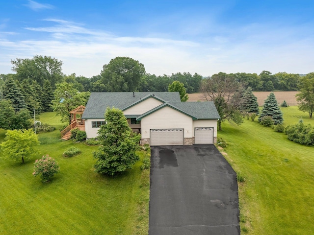 21233 Pierce St NE, East Bethel, MN 55011 - ranch-style house featuring a garage, a front yard, asphalt driveway, and roof with shingles