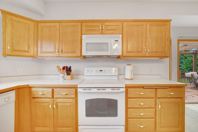 21233 Pierce St NE, East Bethel, MN 55011 - kitchen featuring white appliances, light countertops, and light wood-style floors