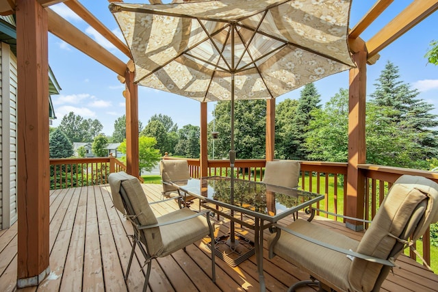 21233 Pierce St NE, East Bethel, MN 55011 - wooden deck with outdoor dining space and view of scattered trees