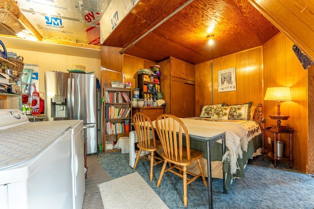 3382 Breezy Point Rd, Greenwood Twp, MN 55790 - carpeted bedroom featuring stainless steel fridge, washer / clothes dryer, and wooden walls