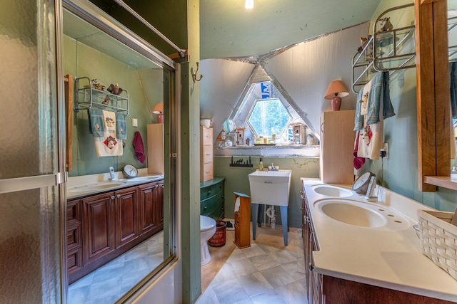 3382 Breezy Point Rd, Greenwood Twp, MN 55790 - bathroom featuring vanity, toilet, and a shower with door