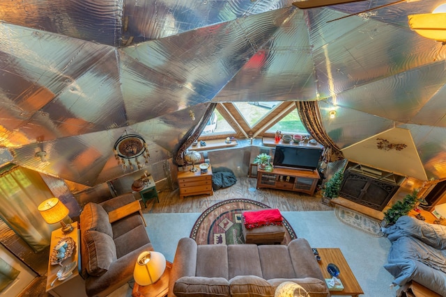 3382 Breezy Point Rd, Greenwood Twp, MN 55790 - living room featuring wood finished floors and lofted ceiling