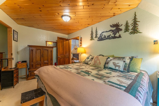 3382 Breezy Point Rd, Greenwood Twp, MN 55790 - bedroom featuring wood ceiling, carpet, and a textured wall