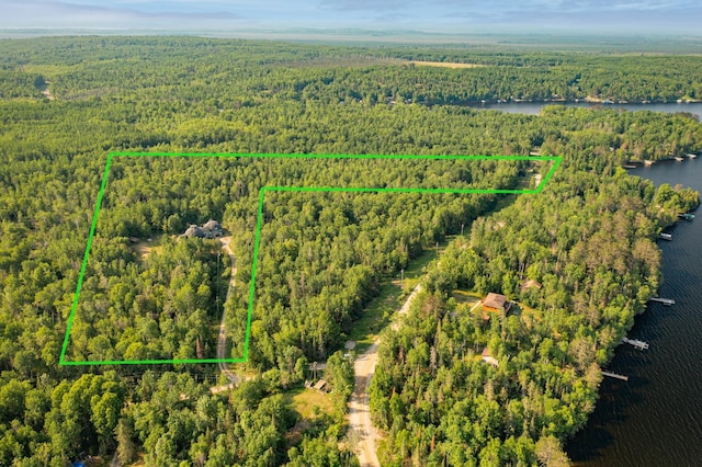 3382 Breezy Point Rd, Greenwood Twp, MN 55790 - aerial view of property's location featuring a heavily wooded area, a large body of water, and property boundaries highlighted