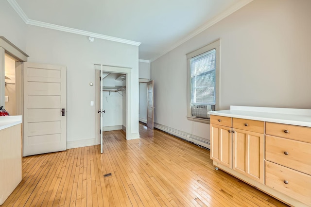 774 Capitol Hts, Saint Paul, MN 55103 - unfurnished bedroom with crown molding, light wood-type flooring, a baseboard heating unit, a closet, and cooling unit