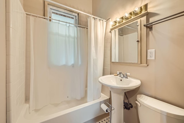 774 Capitol Hts, Saint Paul, MN 55103 - bathroom with shower / bath combo with shower curtain and toilet