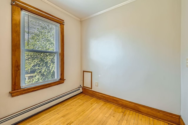 774 Capitol Hts, Saint Paul, MN 55103 - spare room featuring baseboard heating, crown molding, and light wood-style floors