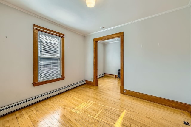 774 Capitol Hts, Saint Paul, MN 55103 - empty room featuring a baseboard radiator, light wood-type flooring, ornamental molding, and a smoke detector