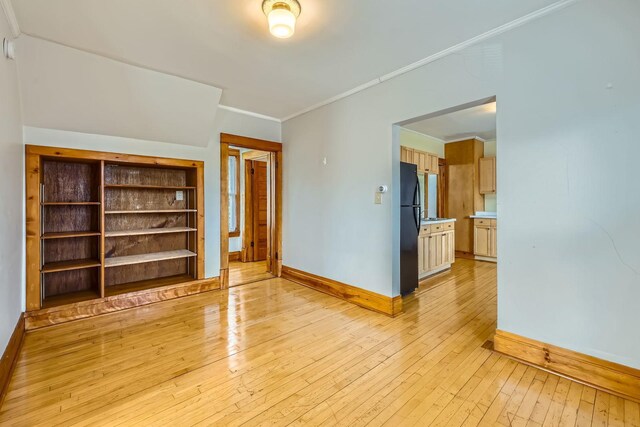 774 Capitol Hts, Saint Paul, MN 55103 - empty room featuring light wood-style floors and ornamental molding
