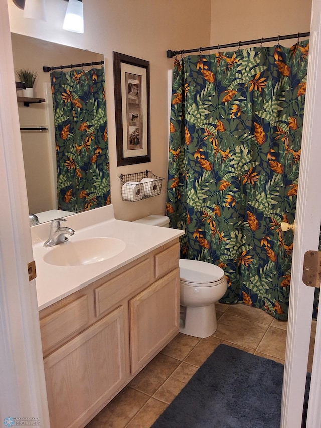 3307 38th St S, Moorhead, MN 56560 - full bathroom featuring tile patterned floors, vanity, and toilet