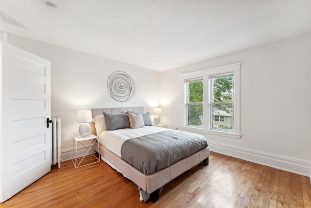 786 Iglehart Ave, Saint Paul, MN 55104 - bedroom featuring light wood-style flooring and baseboards