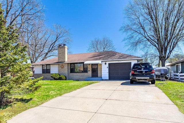 7533 16th Ave S, Richfield, MN 55423 - ranch-style home with a garage, driveway, a front lawn, a chimney, and brick siding