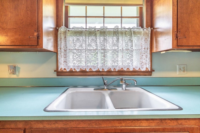 2814 Lakeview Dr, Fergus Falls, MN 56537 - kitchen with a sink and brown cabinetry
