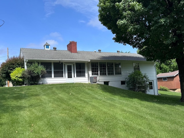 2814 Lakeview Dr, Fergus Falls, MN 56537 - rear view of property featuring a yard and a chimney