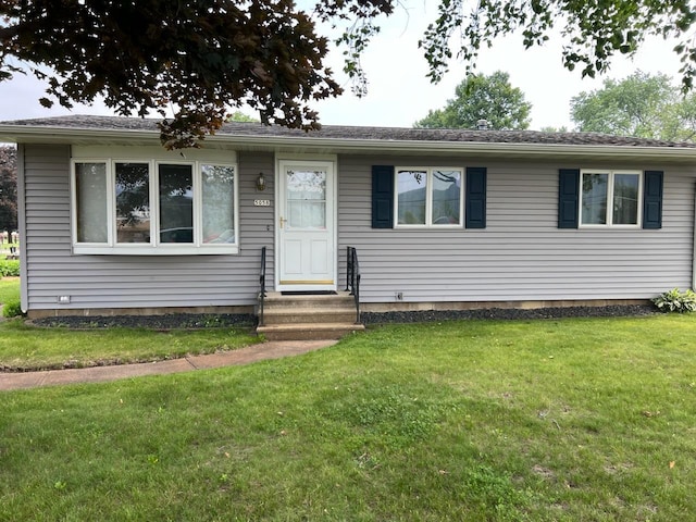 5058 8th St, Winona, MN 55987 - view of front of property with a front yard and entry steps
