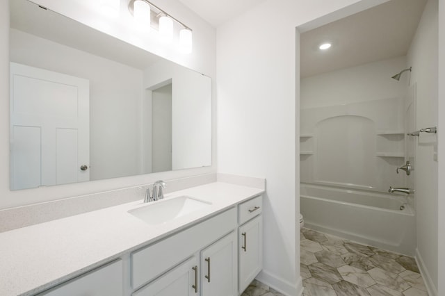 2508 Downing Ave, Shakopee, MN 55379 - full bathroom with vanity, marble finish floors, toilet, baseboards, and bathtub / shower combination