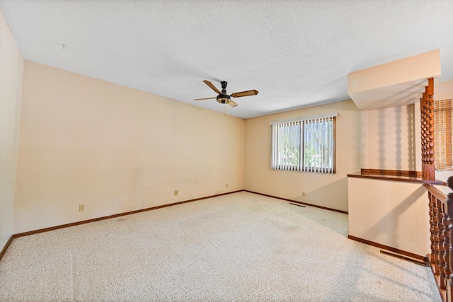 635 5th St, Windom, MN 56101 - unfurnished room with ceiling fan and carpet flooring