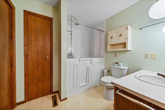 635 5th St, Windom, MN 56101 - bathroom featuring tile patterned floors and vanity