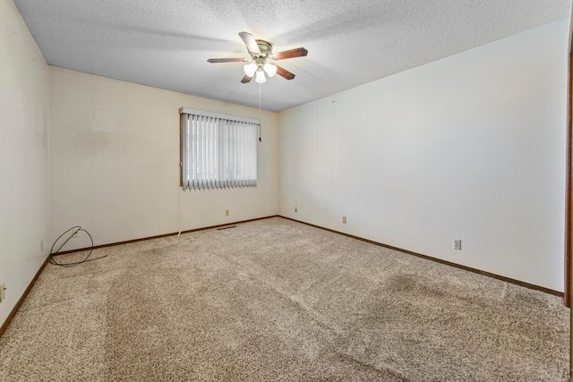 635 5th St, Windom, MN 56101 - carpeted empty room with ceiling fan and a textured ceiling