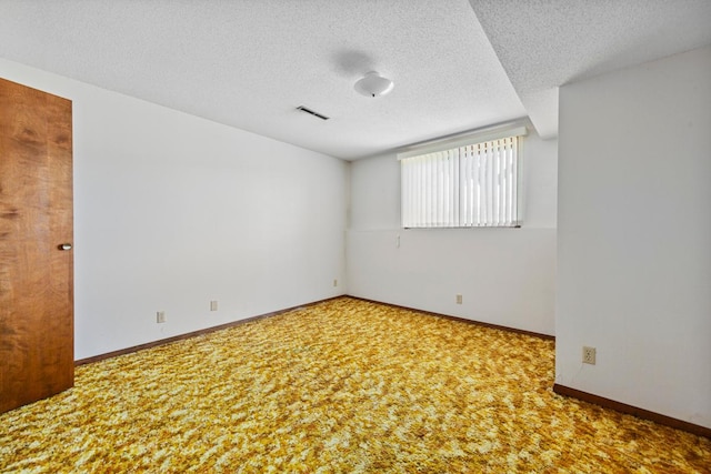 635 5th St, Windom, MN 56101 - unfurnished room featuring carpet flooring and a textured ceiling