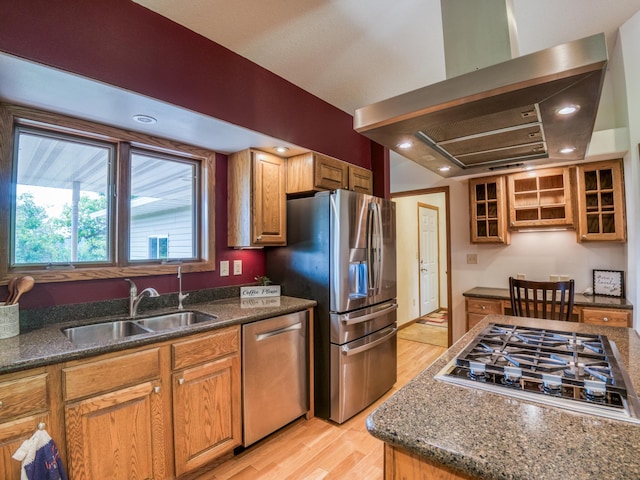 22152 Polaris Rd NW, Puposky, MN 56667 - kitchen featuring extractor fan, appliances with stainless steel finishes, light wood-style flooring, glass insert cabinets, and recessed lighting