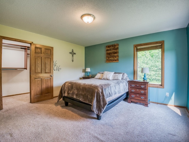 22152 Polaris Rd NW, Puposky, MN 56667 - carpeted bedroom with a textured ceiling and baseboards