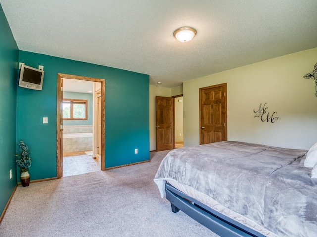 22152 Polaris Rd NW, Puposky, MN 56667 - bedroom with a textured ceiling, carpet, and connected bathroom