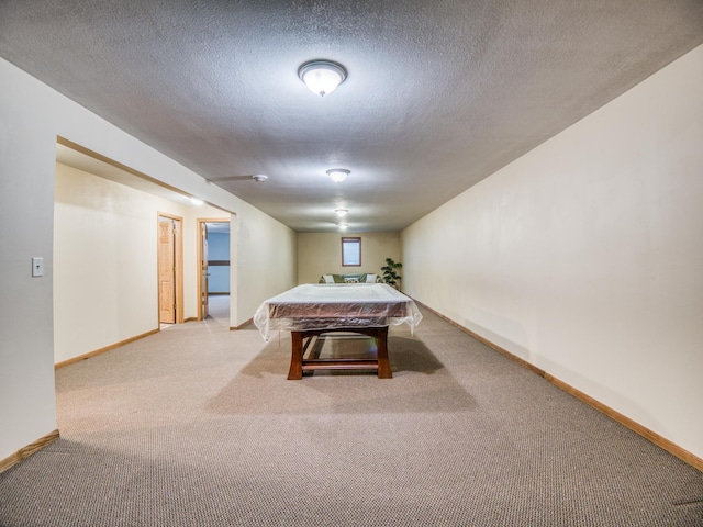 22152 Polaris Rd NW, Puposky, MN 56667 - playroom featuring carpet flooring, billiards, and a textured ceiling