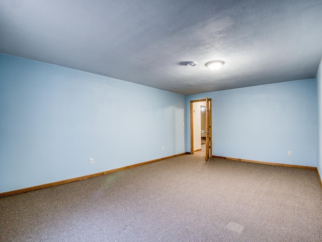 22152 Polaris Rd NW, Puposky, MN 56667 - spare room featuring baseboards and carpet flooring