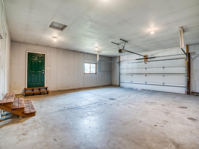 22152 Polaris Rd NW, Puposky, MN 56667 - garage featuring a garage door opener