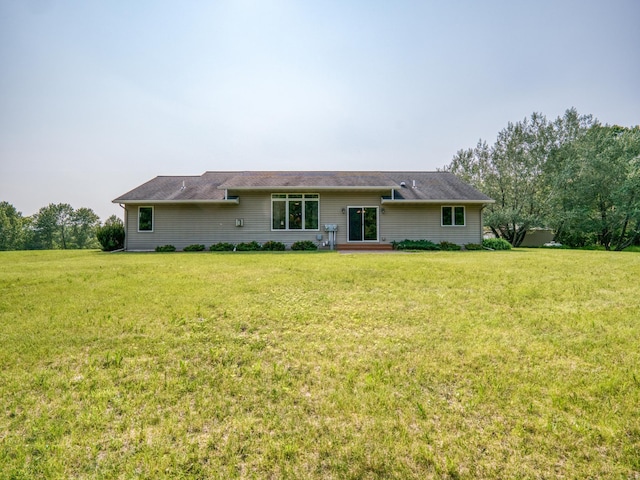 22152 Polaris Rd NW, Puposky, MN 56667 - rear view of property with a yard