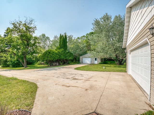 22152 Polaris Rd NW, Puposky, MN 56667 - garage with view of wooded area