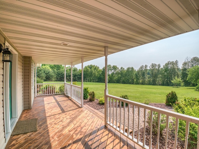 22152 Polaris Rd NW, Puposky, MN 56667 - wooden porch with a lawn