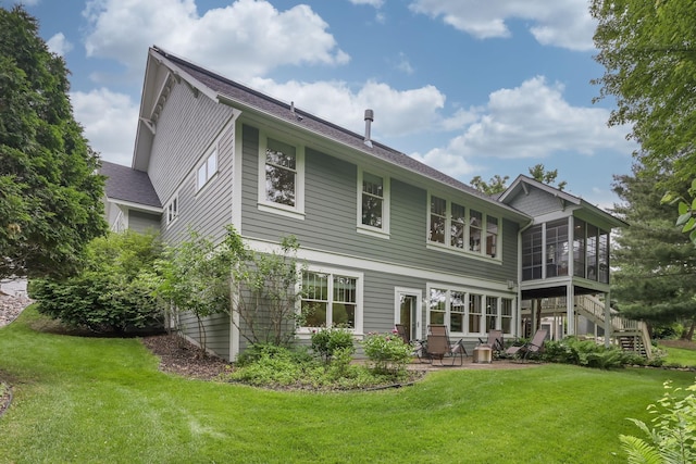 3543 Eben Way, Stillwater, MN 55082 - back of property featuring a patio, a lawn, and a sunroom