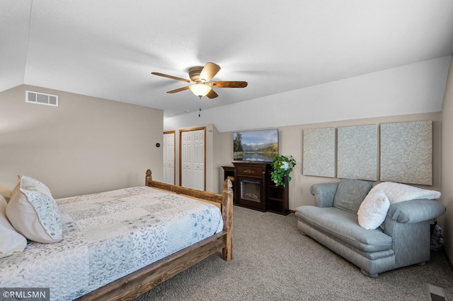 5261 Fenson Ct N, Hugo, MN 55038 - bedroom featuring carpet flooring, lofted ceiling, ceiling fan, and a closet
