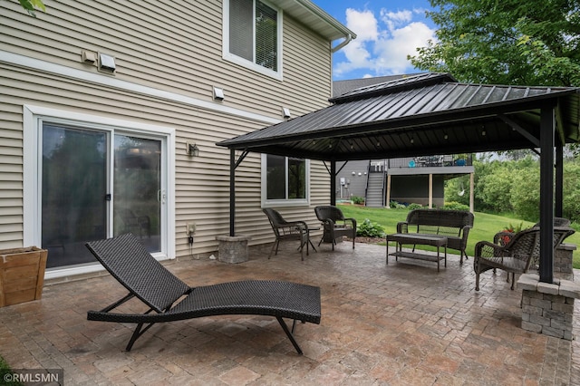 5261 Fenson Ct N, Hugo, MN 55038 - view of patio with a gazebo and an outdoor living space