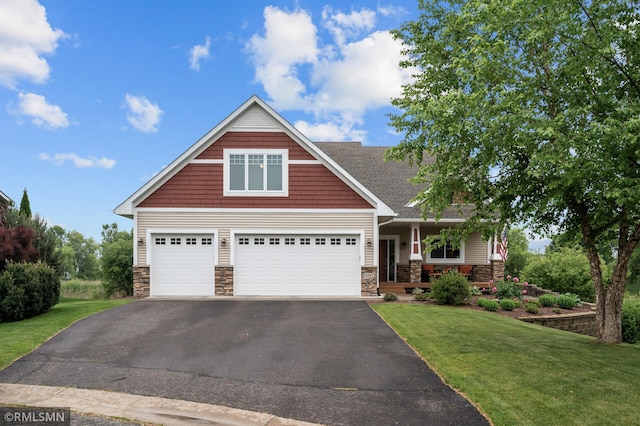 5261 Fenson Ct N, Hugo, MN 55038 - craftsman-style house with stone siding, driveway, a porch, and a front yard