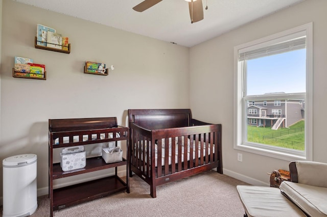 17552 57th St NE, Otsego, MN 55374 - carpeted bedroom featuring baseboards and a ceiling fan
