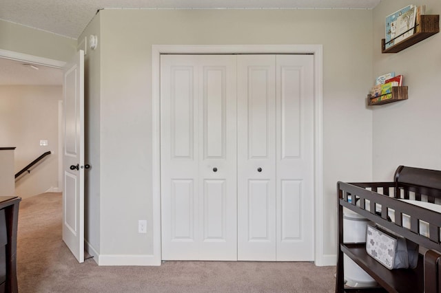 17552 57th St NE, Otsego, MN 55374 - carpeted bedroom featuring a closet and baseboards