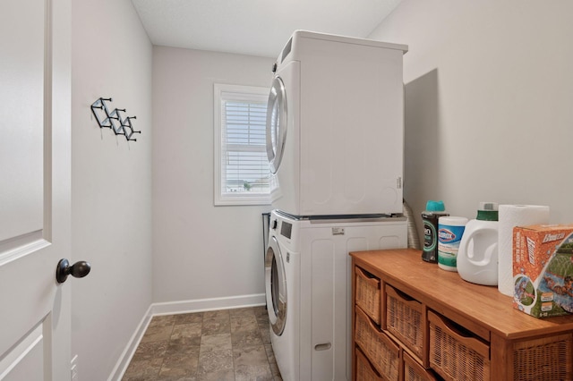 17552 57th St NE, Otsego, MN 55374 - laundry area with stacked washing machine and dryer and stone finish flooring